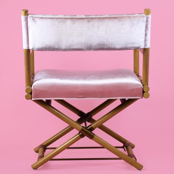 "Side view of faux bamboo Hollywood Regency director's chair"