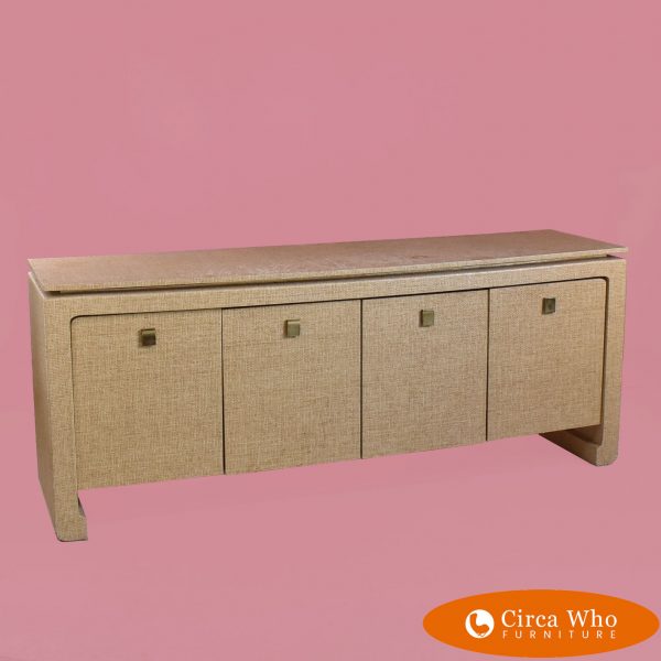 Grasscloth and brass credenza