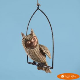 Large Owl on a Swing