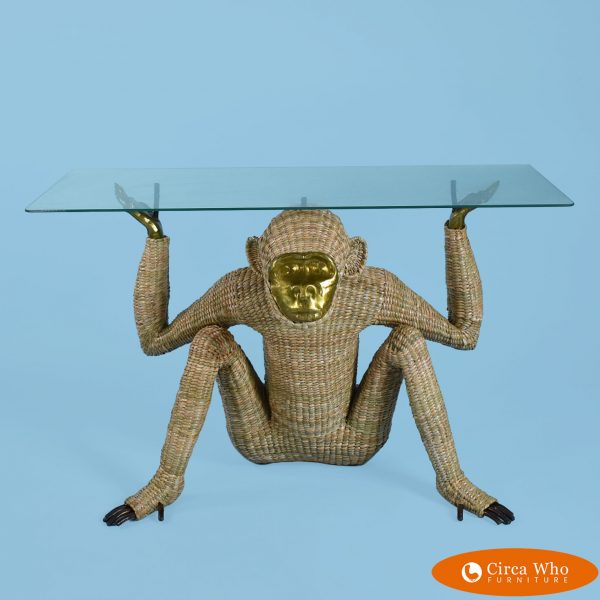 Monkey with brass mask glass top console
