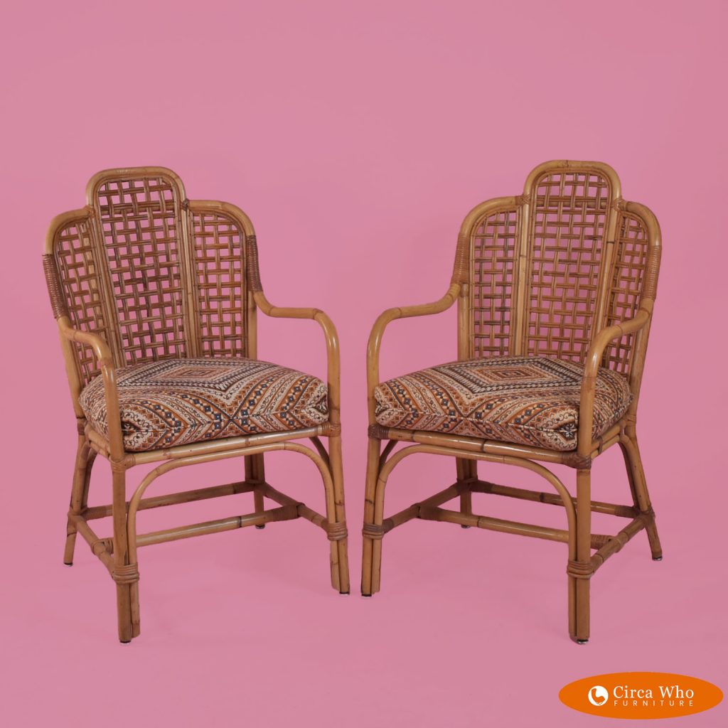 Pair of Rattan Arm Chairs Circa Who