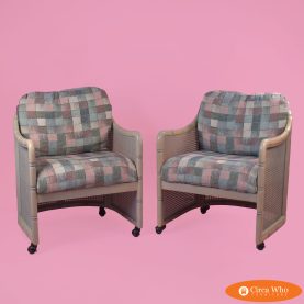 Pair of Faux Bamboo and Cane Barrel Chairs in Casters