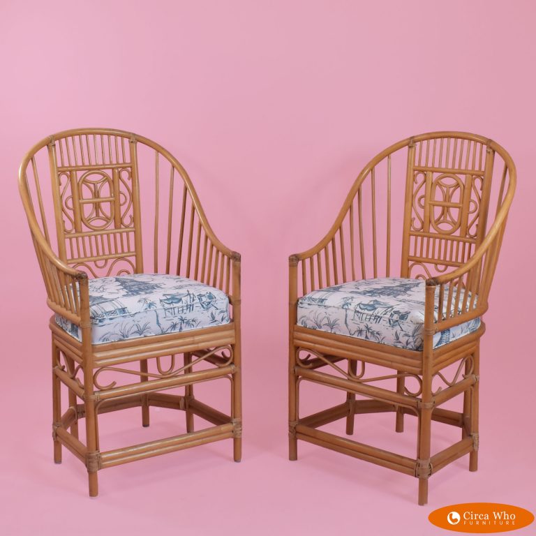 Pair of Fretwork Rattan Chairs in Casters Circa Who