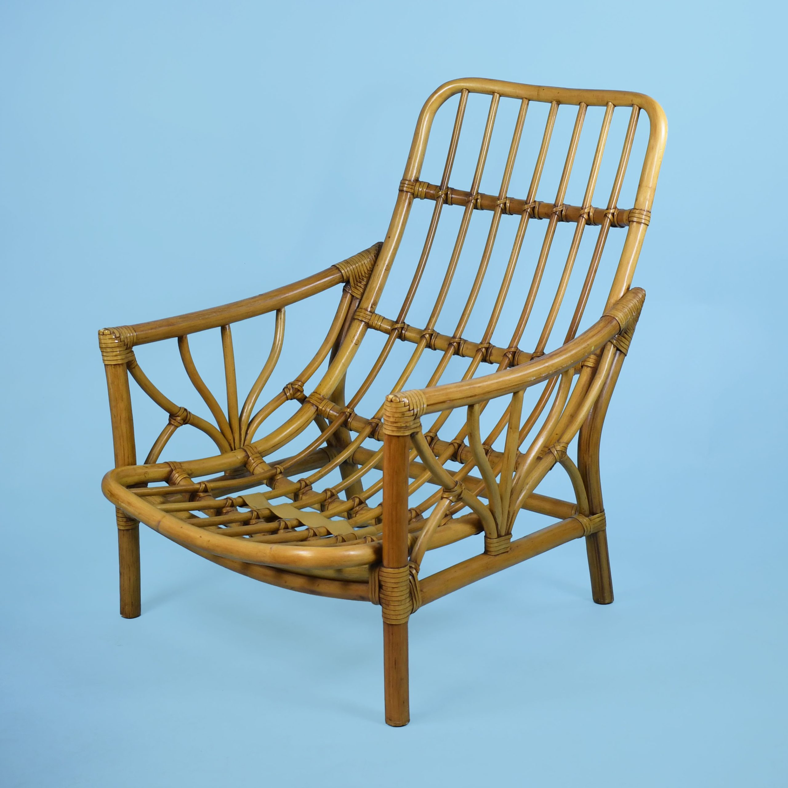 Pair of Rattan Lounge Chairs and Ottoman By McGuire