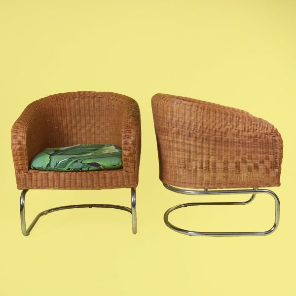 Pair of Woven Rattan and Chrome Barrel Chairs