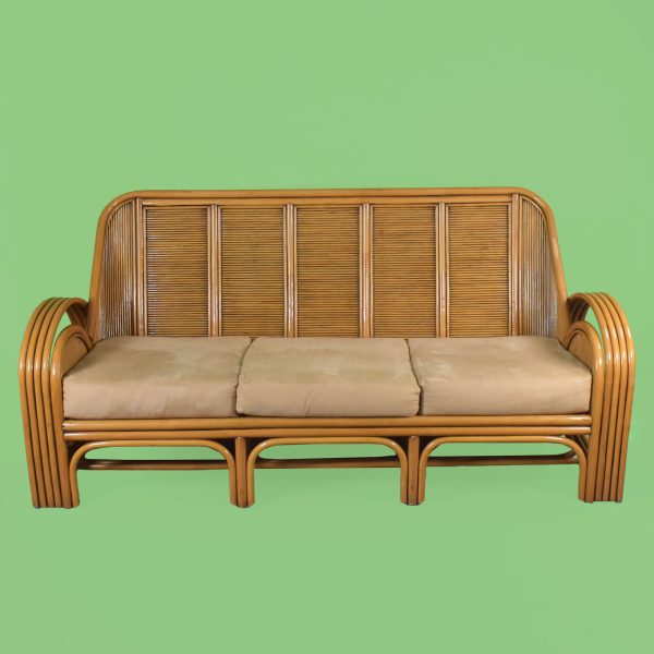 Sculptural Rattan Sofa With Magazine Rack