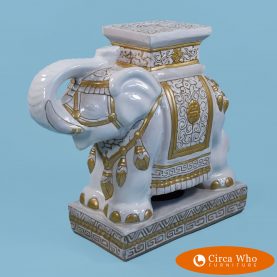 White and gold elephant garden seat in ceramic