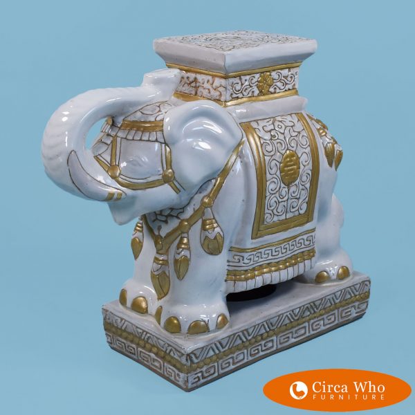 White and gold elephant garden seat in ceramic